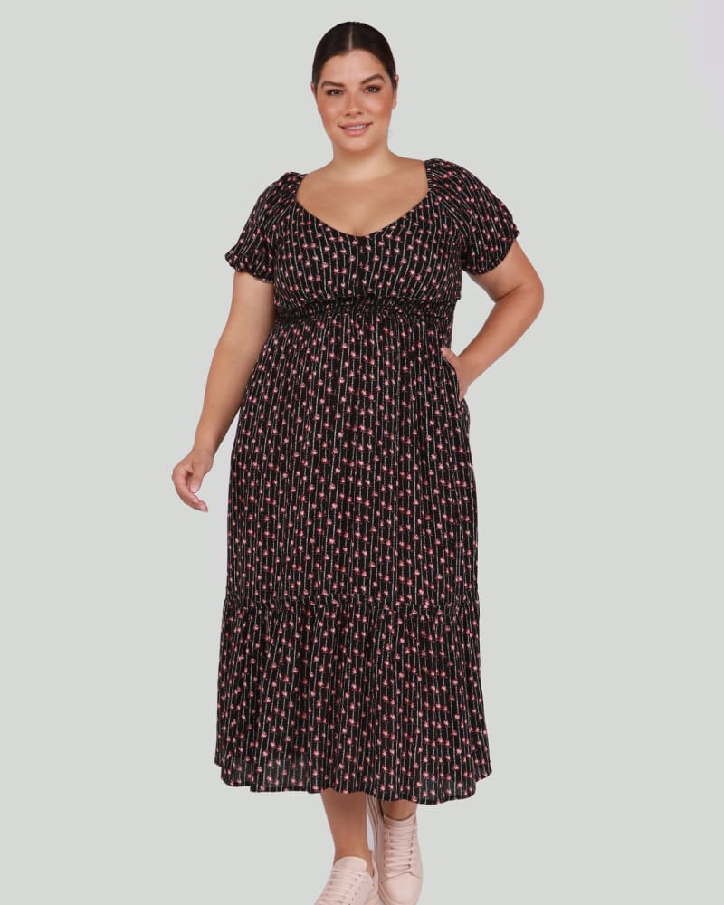 Front of a model wearing a size 1X Rhea Smocked Waist Maxi Dress in Floral Fancy by DEX PLUS. | dia_product_style_image_id:260590